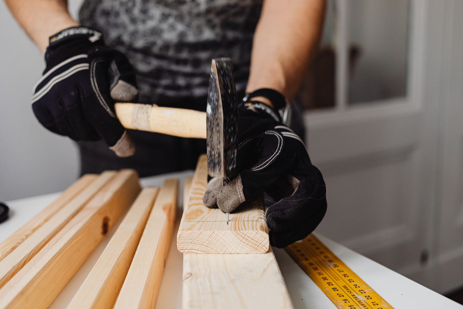 A superintendent checking framing on site